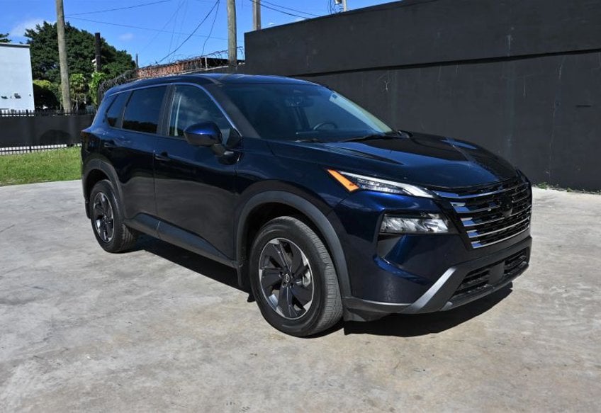 2025 Nissan Rogue SV — rebuilt & branded title, 56% below market